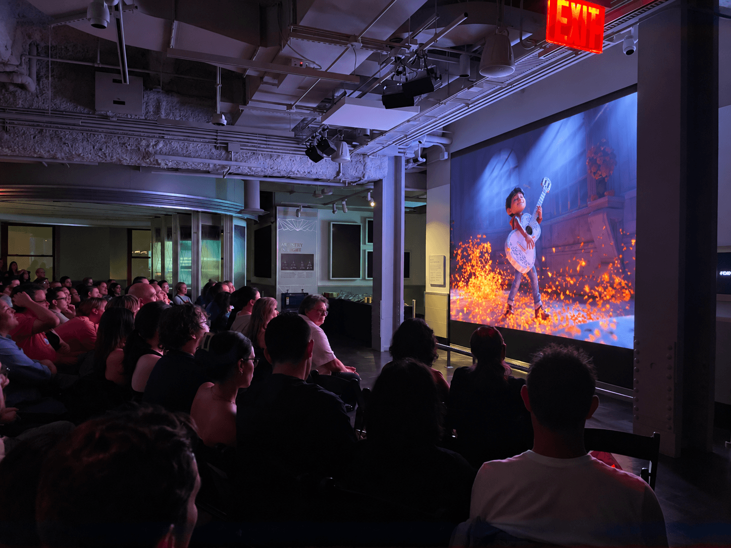 People watching Coco on the 80th Floor of the Empire State Building Observation Deck
