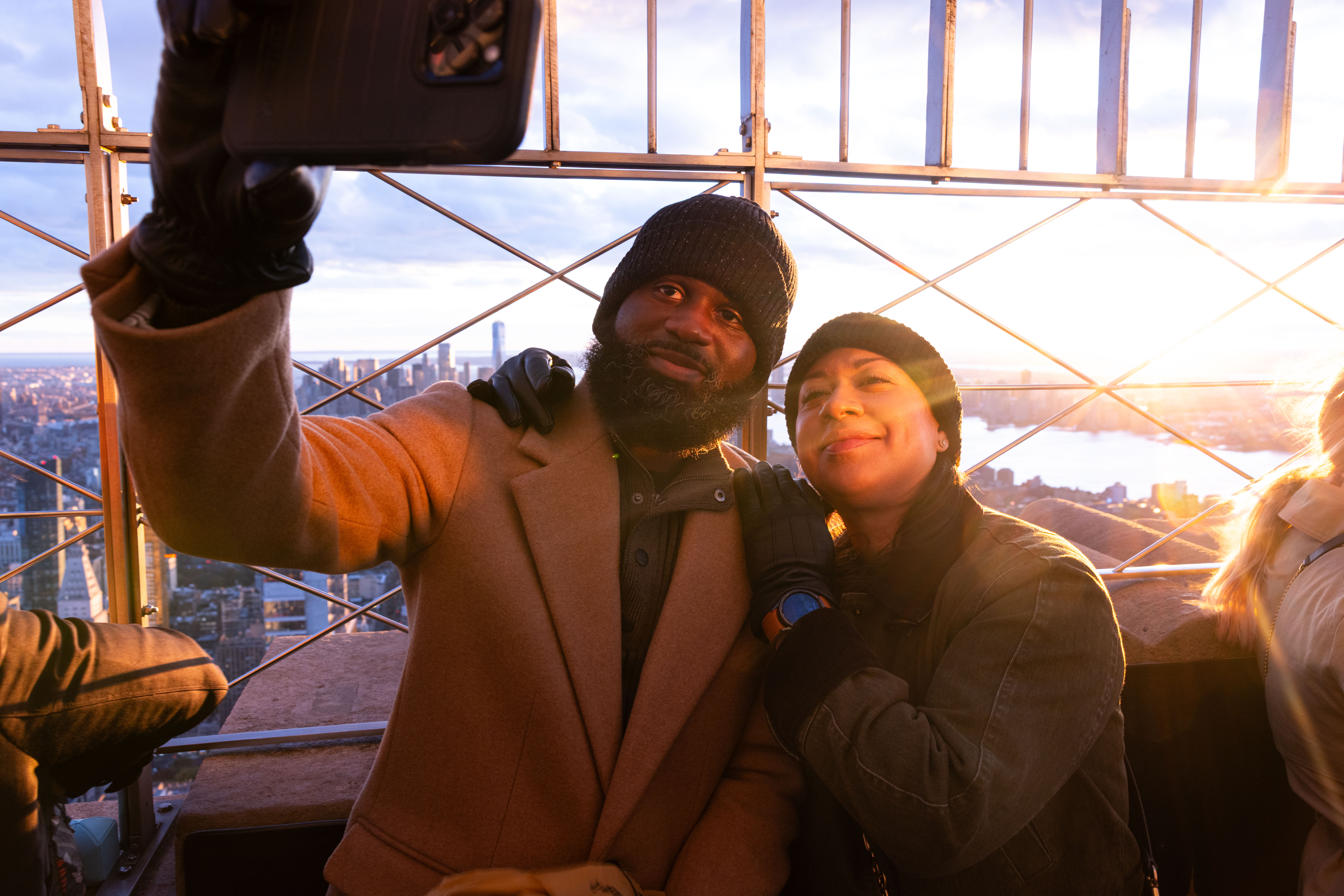 Couple taking a selfie on the 86th Floor Observation Deck at the Empire State Building Observatory