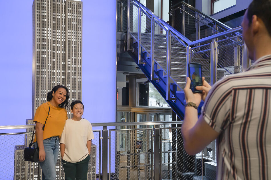 Family taking photo on the Grand Staircase